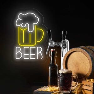 Un cartel de Cerveza Neón con un vaso de cerveza al lado.